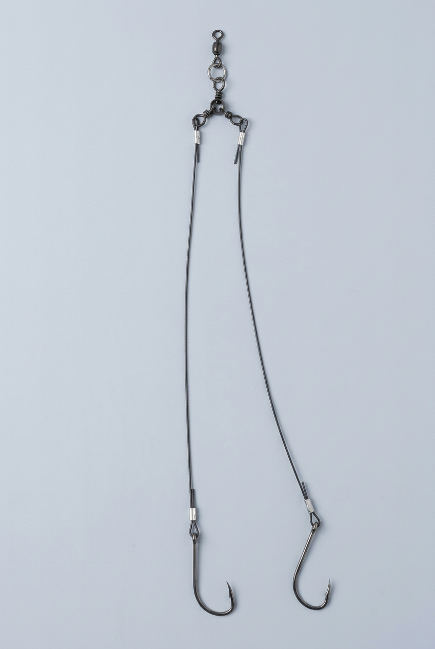 Single double-hook rig with a clean studio background